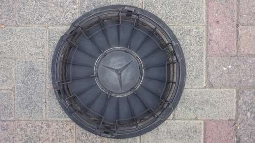 Mercedes Benz 1993 E-Class model hub caps chipped