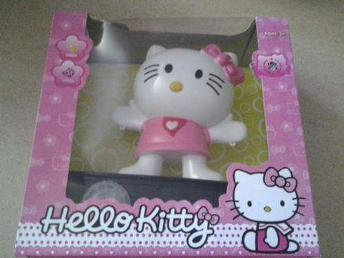 Hello kitty on scateboard, plastic figurines, perfect as cake topper 22cm