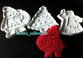 Plastic christmas cutters. Angel. Christmas tree. Father Christmas