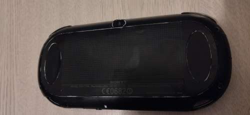 Sony Playstation Vita, Transparent Protective Hard Cover, 4GB Memory Card, 2 Games and Charger