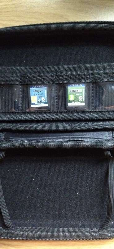 Sony Playstation Vita, Vita Case, 4GB Memory Card, 2 Games, SD2Vita (64GB) and Charger