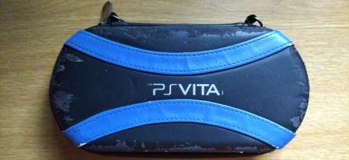 Sony Playstation Vita, Vita Case, 4GB Memory Card, 2 Games, SD2Vita (64GB) and Charger