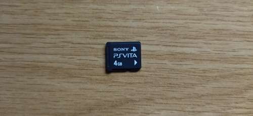 Sony Playstation Vita, Vita Case, 4GB Memory Card, 2 Games, SD2Vita (64GB) and Charger