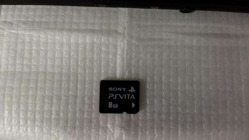 Sony Playstation Vita Slim Edition(IMMACULATE CONDITION) + 12 Games + 8GB Card + SD2Vita + Extras