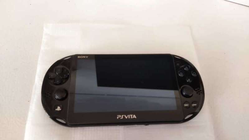 Sony Playstation Vita Slim Edition(IMMACULATE CONDITION) + 12 Games + 8GB Card + SD2Vita + Extras