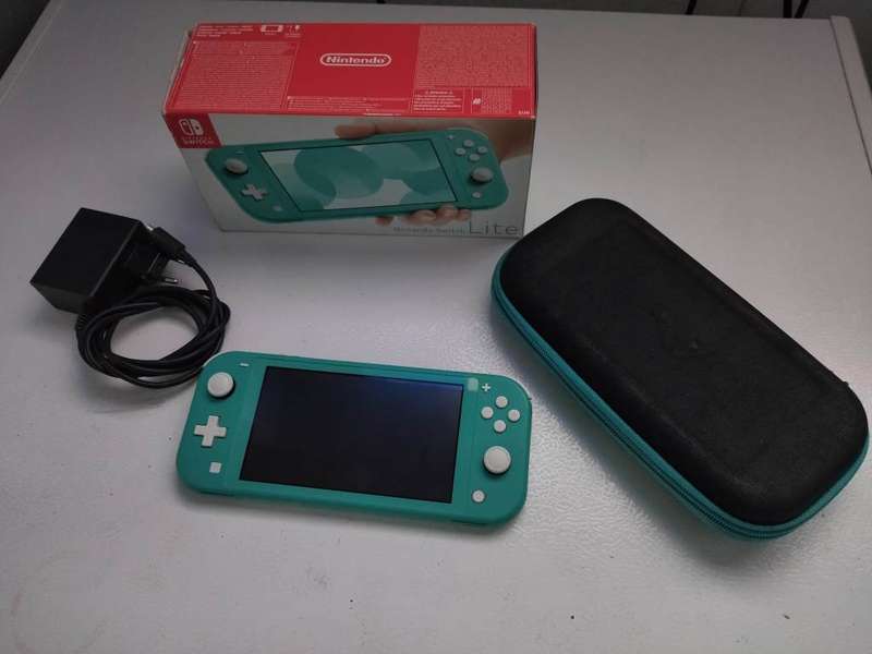 Nintendo Switch Lite (Turquoise) + Sandisk Extreme Pro 64 GB Memory Card with games + Carrying Pouch