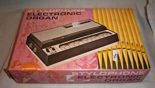 A VINTAGE BOXED STYLOPHONE ELECTRONIC ORGAN, STILL WORKING