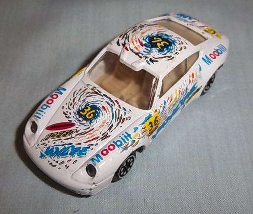 A NICE WHITE PORCH STYLE CAR