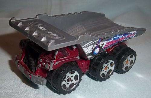 A RED DUMP TRUCK BY MATCHBOX, 2001
