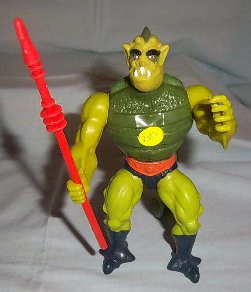 A MOTU WHIPLASH FIGURE WITH WEAPON