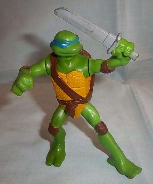 A SMALL LEONARDO FIGURE, MADE FOR MCDONALDS