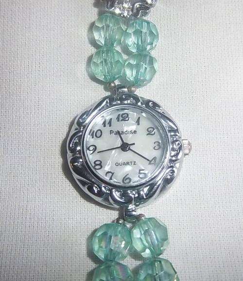 A QUARTZ PARADISE WOMAN'S FASHION WRIST WATCH
