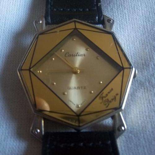 A MEN'S QUARTZ CARITIAR WRIST WATCH
