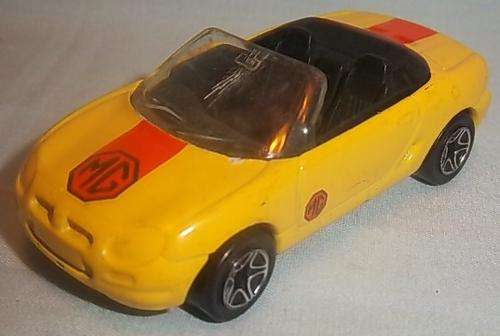 A YELLOW MG, F1-8i BY MATCHBOX 1997
