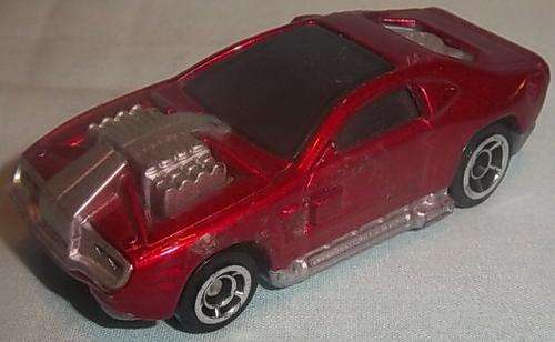 A RED CAR MADE FOR MCDONALDS BY HOTWHEELS
