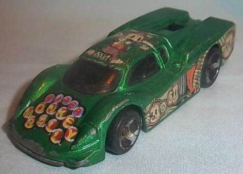 A GREEN SUPER MONKEY BALL CAR BY HOTWHEELS