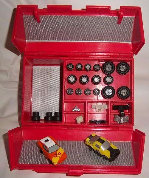 A VERY RARE MICRO MACHINES TOOLBOX WITH SELF ASSEMBLE CARS