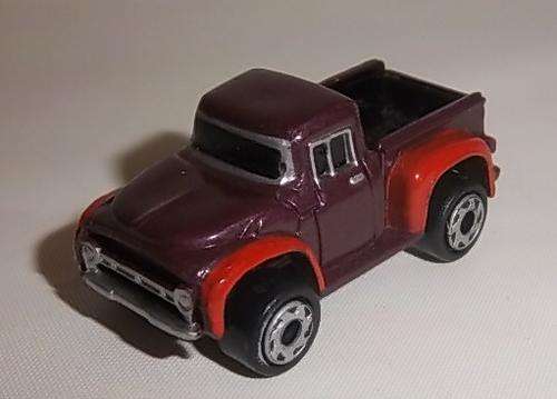 A BROWN PICK UP TRUCK BY MICRO MACHINES