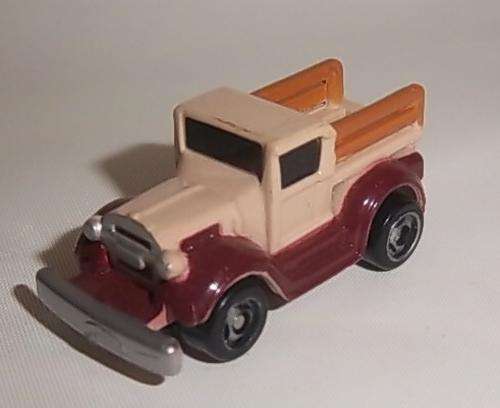 A VINTAGE STYLE PICK UP TRUCK BY MICRO MACHINES