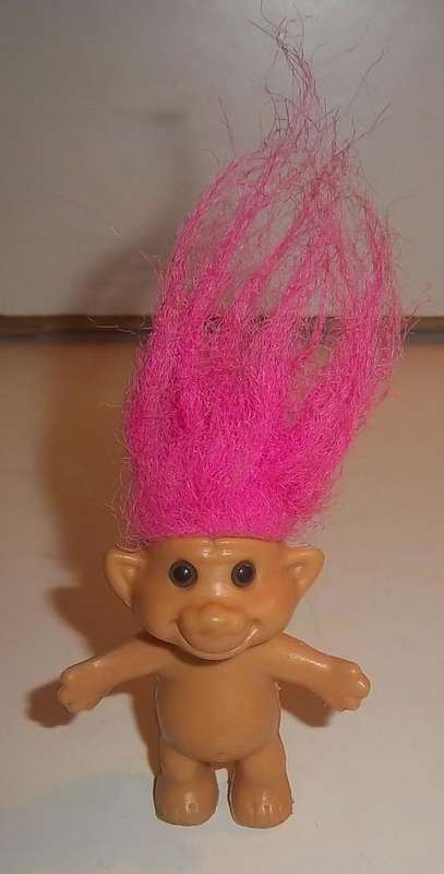 A SMALL PINK HAIR TROLL BY ACME 1991