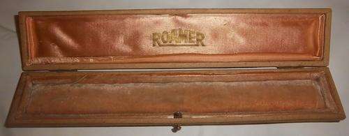 A VINTAGE BROWN ROAMER WATCH CASE