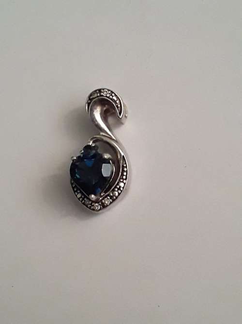 Blue Topaz set in 925 Sterling Silver