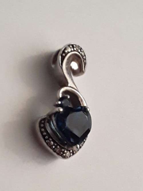 Blue Topaz set in 925 Sterling Silver