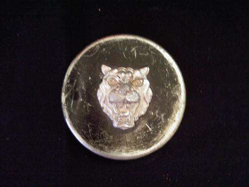 BADGE WITH A TIGER FACE