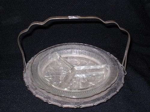 A SILVER PLATED SNACK DISH