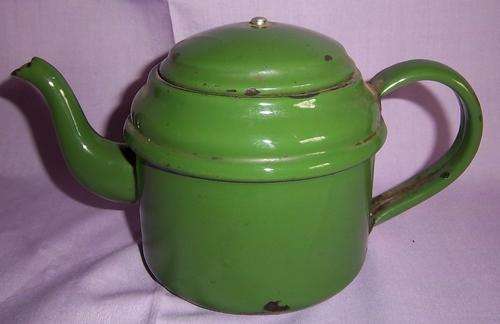 A VERY OLD GREEN ENAMEL TEA POT