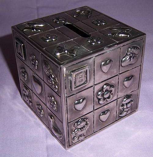 A CUTE METAL MONEY BOX