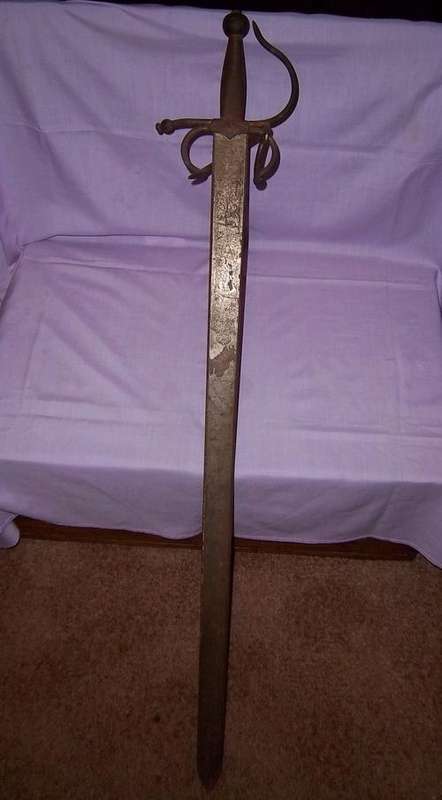 A VINTAGE SPANISH DECORATIVE SWORD STARTING AT R1