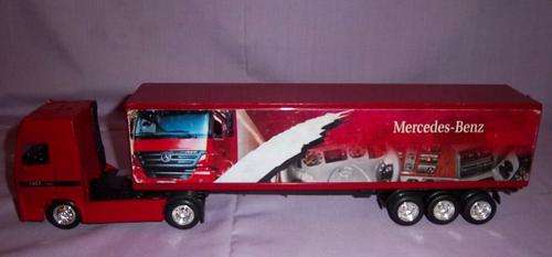 A MERCEDES - BENZ TRUCK WITH TRAILER STARTING AT R1