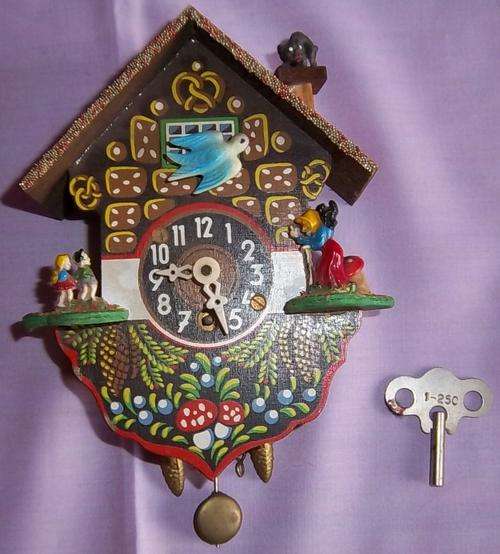 A LOVELY MINIATURE CLOCK