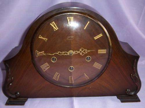 A SMITHS MANTLE CLOCK WITH WEST MINISTER CHIME
