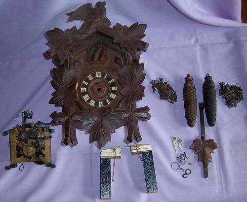 A CUCKOO CLOCK FOR REPAIR, ALL THE PARTS ARE THERE, STARTING AT R1