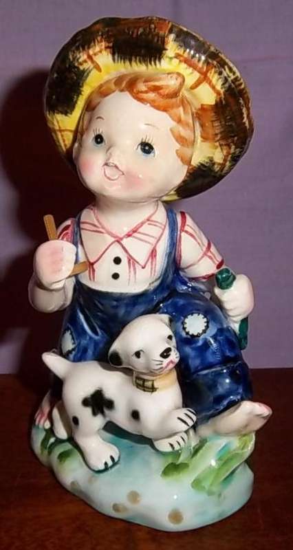 A LITTLE FISHER BOY AND HIS DOG BY CAPRI, HAND PAINTED