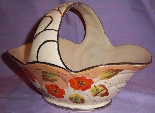 A STUNNING ARTHUR WOOD BASKET