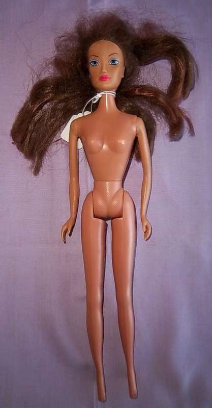 A DOLL WITH PINK LIPS AND A LONG FACE