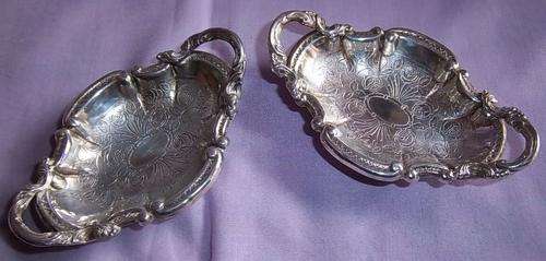 A PAIR OF STUNNING ORNATE EPNS TEA BAG/TEA SPOON DISHES
