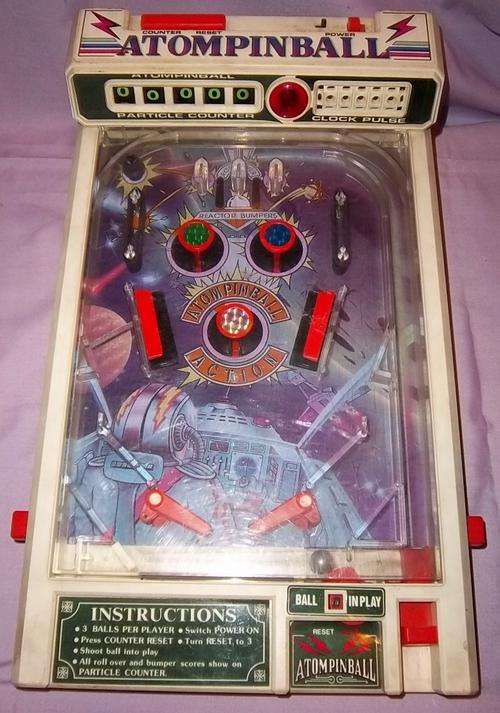 A VINTAGE ATOMPINBALL MACHINE BY CHENG CHING TOYS 1988