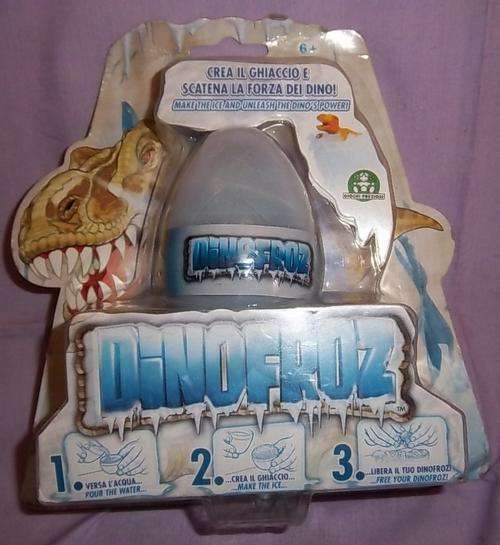 A DINOFROZ EGG AND DINO STILL IN BOX
