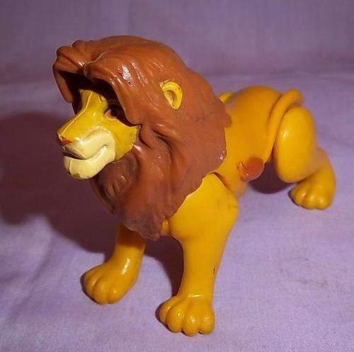 A SIMBA FIGURE FROM THE MOVIE LION KING