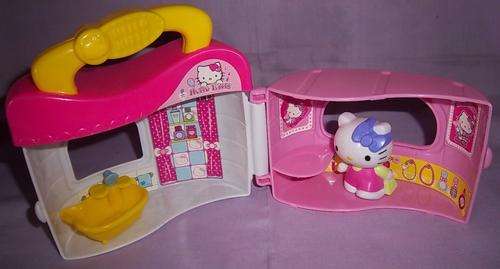 A HELLO KITTY HOUSE WITH BATH AND KITTY MADE BY SANRIO
