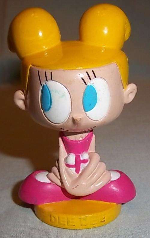 A SMALL PLASTIC DEE DEE FIGURINE(DEXTER'S SISTER)