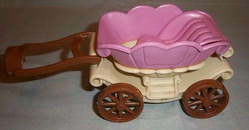 A PLASTIC HORSE COACH FOR DOLLS