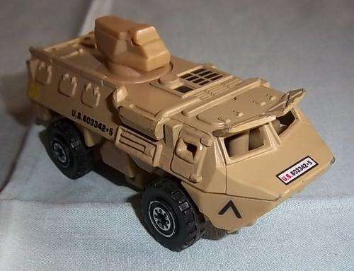 A DIE CAST AND PLASTIC ARMY VEHICLE