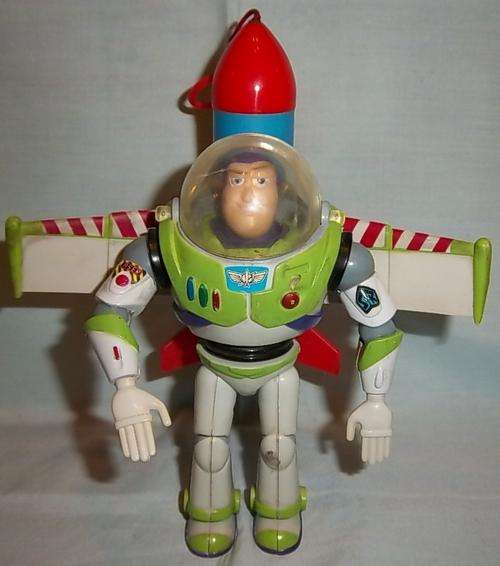 A VINTAGE BUZZ LIGHTYEAR WITH THE BIG ONE ROCKET ON HIS BACK BY THINKWAY