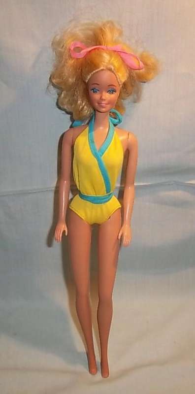 VINTAGE 1976 BARBIE DOLL IN A YELLOW SWIM SUITE