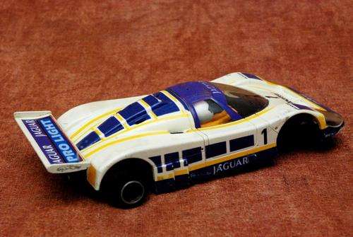 4 scalextrix cars for parts or rebuild